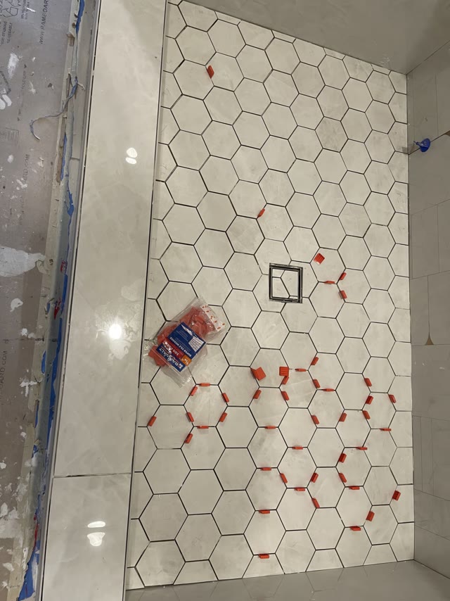 Shower floor under construction before tile installation